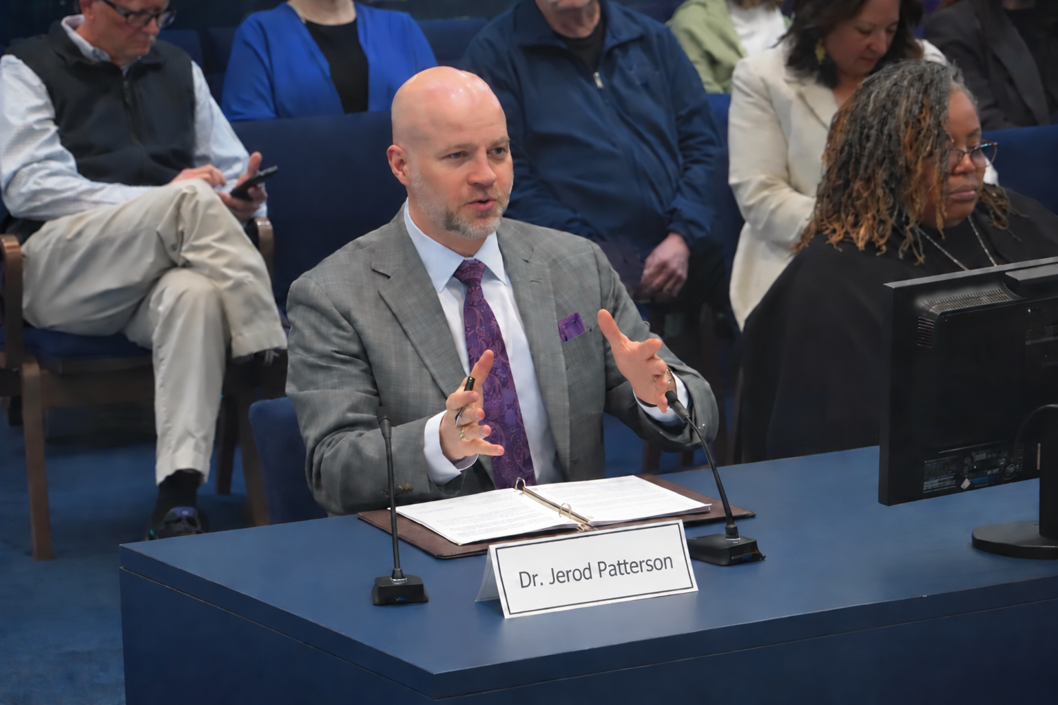 Jerod Patterson participating in a public discussion in Jacksonville
